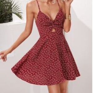 Red Sun dress with small white flowers